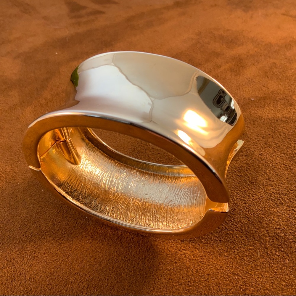Gold tone clamper bracelet